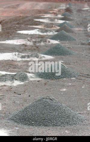 driller drilling holes on rock for detonation.mining industry. Stock Photo