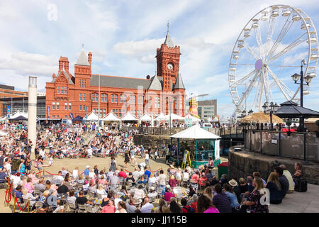 Cardiff, United Kingdom -  July 14, 2017: People are enjoying themselves and listen to music on the opening day of the Cardiff International Food Fest Stock Photo