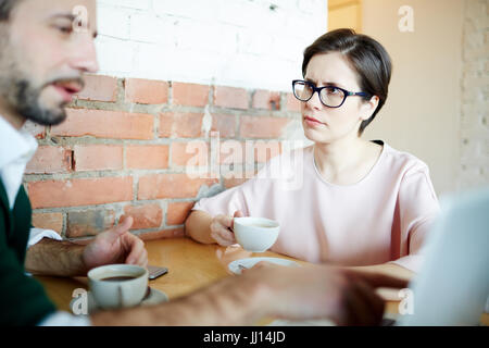 Presentation at coffee-break Stock Photo