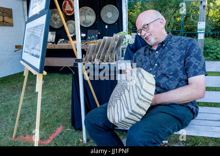 Craftsman artist, 40th Annual Vancouver Folk Music Festival, Vancouver, British Columbia, Canada. Stock Photo