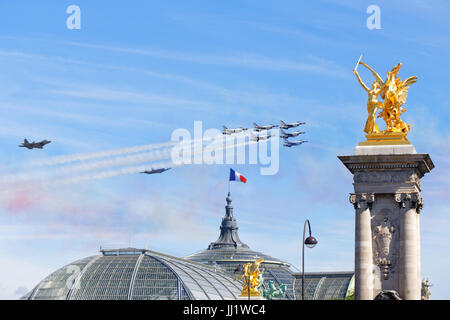 US Air Force Thunderbirds and F22 Lightnings flying over Paris for the 14th of July 2017 celebration Stock Photo