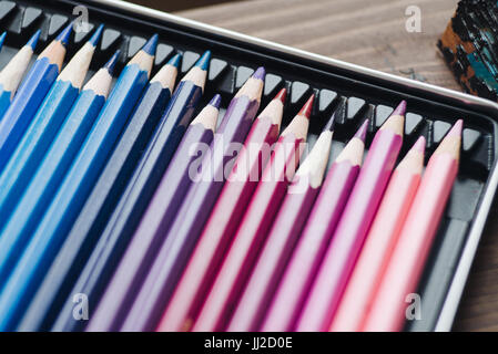 Colorful pencils in the box blue pink red Stock Photo