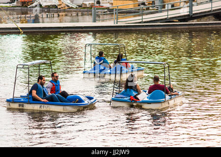 Montreal, Canada - May 27, 2017: Old port Bonsecours market basin area with people on pedal boats in city in Quebec region during sunset Stock Photo
