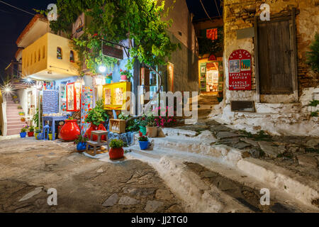 Main street with shops in Chora of Alonissos island, Greece. Stock Photo