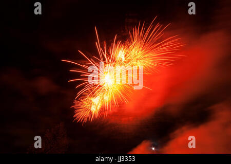 Fireworks light up close-up against dark sky Stock Photo