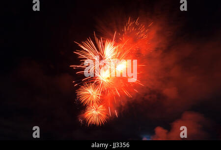Fireworks light up close-up against dark sky Stock Photo