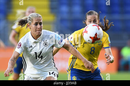 Germany's Anna Blaesse (l) and Sweden's Lotta Schelin in action during the UEFA Women's EURO 2017 football match between Germany and Sweden at the Rat Verlegh Stadion in Breda, the Netherlands, 17 July 2017. Photo: Carmen Jaspersen/dpa Stock Photo