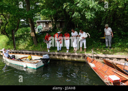 London, UK. 17th July, 2017. Swan Upping takes place on the River Thames near Windsor, Berkshire, UK. The annual event dates from medieval times, when The Crown claimed ownership of all mute swans which were considered an important food source for banquets and feasts. Today, the cygnets are weighed and measured to obtain estimates of growth rates and the birds are examined for any sign of injury, commonly caused by fishing hook and line. The cygnets are ringed with individual identification numbers by The Queen's Swan Warden, whose role is scientific and non-ceremonial. The Queen's Swa Stock Photo