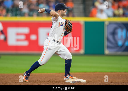 Houston, TX, USA. 17th July, 2017. Houston Astros second baseman Jose Altuve (27) turns a double play during a Major League Baseball game between the Houston Astros and the Seattle Mariners at Minute Maid Park in Houston, TX. Trask Smith/CSM/Alamy Live News Stock Photo