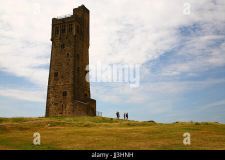 Huddersfield, UK. 18th Jul, 2017. A warm and sunny day at Castle Hill in Huddersfield. The present tower was built to commemorate Queen Victorias Diamond Jubilee in 1897 and is a popular tourists attraction for visitors. Taken on the 18th July 2017 in Huddersfield, West Yorkshire. Credit: Andrew Gardner/Alamy Live News Stock Photo