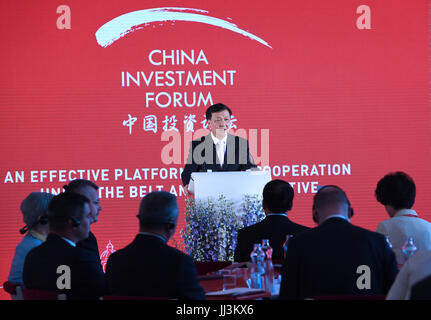 (170718) -- PRAGUE, July 18, 2017 (Xinhua) --  Liu Yunshan, a member of the Standing Committee of the Political Bureau of the Communist Party of China (CPC) Central Committee, addresses the 2017 China Investment Forum in Prague, the Czech Republic, July 18, 2017. (Xinhua/Rao Aimin) (zkr) Stock Photo