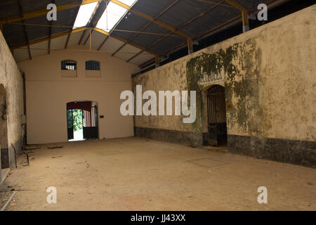 Former prison cells of  notorious penal colony on Salvation's Islands (French Guiana). Henri Charriere was held there. Stock Photo