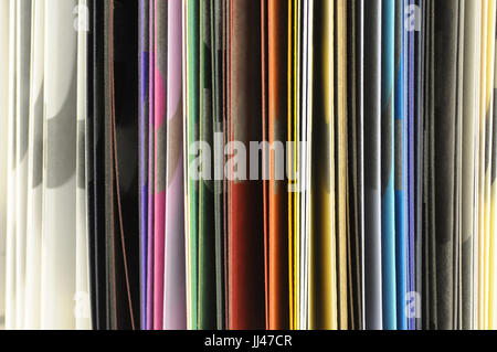 vertical edges of coloured paper samples in a swatch book Stock Photo