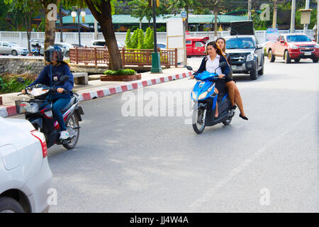 CHIANG MAI, THAILAND - JAN 12, 2017: Traffic on a road in Chiang Mai. Chiang Mai is the second largest city of Thailand Stock Photo