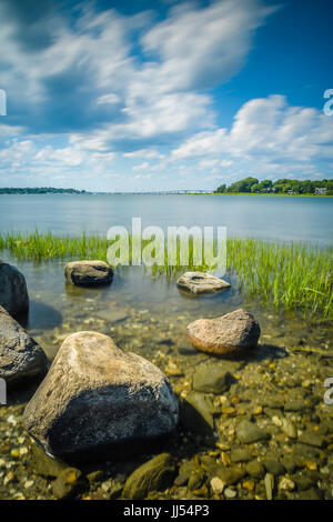 Rocks on the bay in Jamestown, Rhode Island. Stock Photo