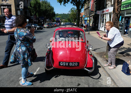 BMW Isetta draws a crowd when parked in street in Yorkshire Stock Photo