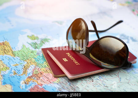 travel concept, two passports on the map of the world, holidays abroad Stock Photo