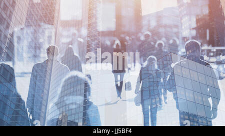 crowd of people walking on the street, double exposure abstract business background Stock Photo