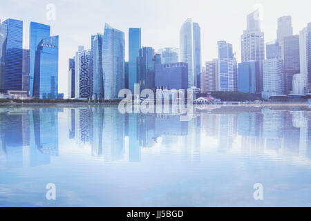 modern cityscape skyline with reflection in the water, business office buildings background with copyspace Stock Photo