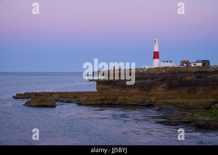 Pre dawn light over the lighthouse at the iconic Portland Bill, Portland, England, UK Stock Photo