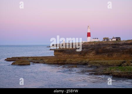 Pre dawn light over the lighthouse at the iconic Portland Bill, Portland, England, UK Stock Photo