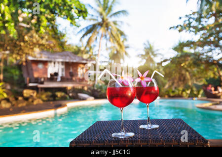luxurious beach hotel, two cocktails near swimming pool, luxury lifestyle Stock Photo