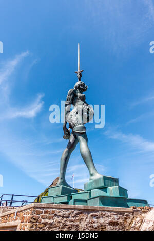 Verity is a stainless steel and bronze statue created by Damien Hirst. The 20.25-metre (66.4 ft) tall sculpture stands on the pier at the entrance to  Stock Photo