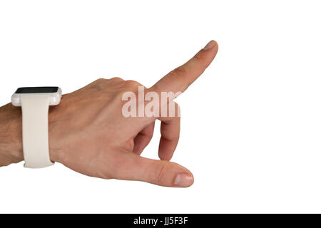 Cropped hand on businessman wearing smart watch against white background Stock Photo