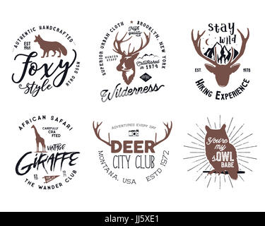Wild animal badges set. Included giraffe, owl, fox and deer shapes. Stock isolated on white background. Good for tee designs, mugs, logotype. Stock Photo
