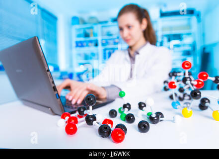 woman in lab with molecular model kit Stock Photo