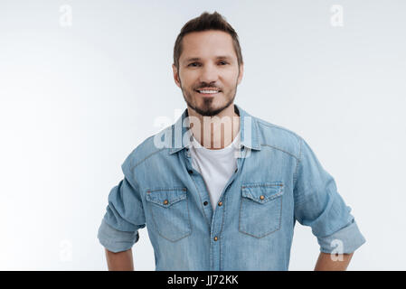 Handsome bearded man standing over white background Stock Photo