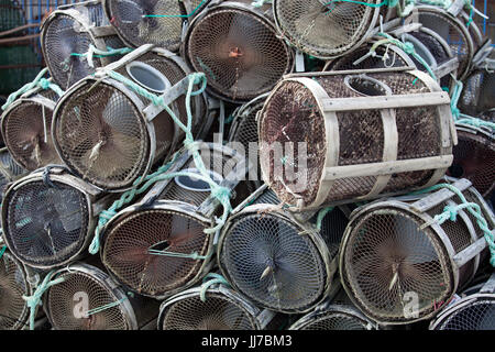 Many octopus traps stacked at the port Stock Photo