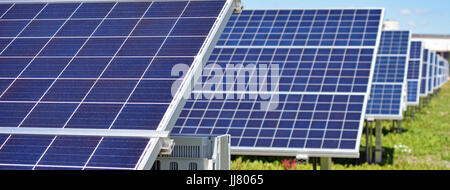 Solar panels on field. Focus on foreground. Stock Photo