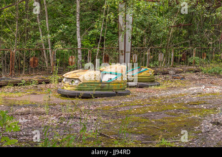 Abandoned Amusement Car Ride in Ghost City of Pripyat in Chernobyl Exclusion Zone Stock Photo