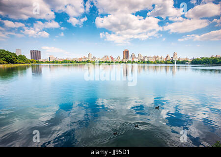 New York Central Park, sky reflection in to lake Jacqueline Kennedy Onassis Reservoir Stock Photo