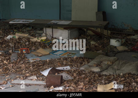 Abandoned School Classroom in Ghost City of Pripyat in Chernobyl Exclusion Zone Stock Photo