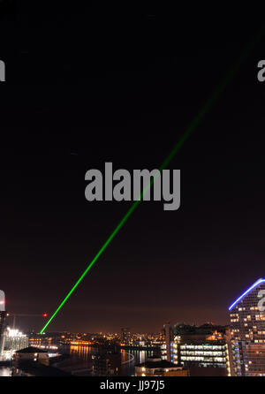 The river Thames with Greenwich and the Greenwich Meridian Line marked out by a green lazer shone from the Royal Greenwich Observatory Stock Photo