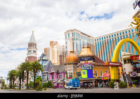 LAS VEGAS, NEVADA - MAY 17, 2017: Colorful street view of Las Vegas Boulevard with hotels and restaurants in view. Stock Photo