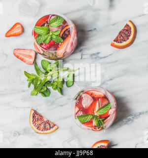 Orange and strawberry summer Sangria in glasses, square crop Stock Photo