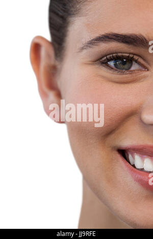 Cropped portrait of happy young woman against white background Stock Photo