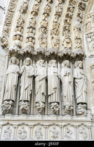 Stone Statues Carved on the facade of Notre Dame Cathedral, Paris, France Stock Photo