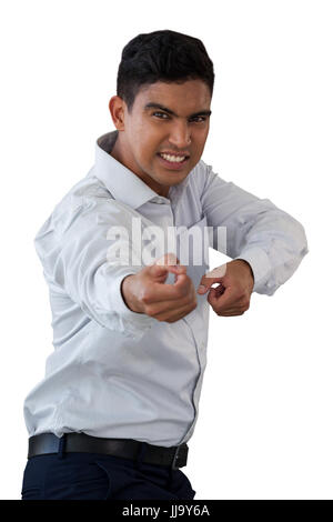 Businessman pulling invisible rope Stock Photo - Alamy