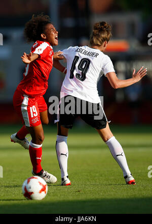 Deventer, Netherlands. 18th July, 2017. Eseco Aigbogum (L) of Switzerland is fouled by Verena Aschauer of Austria during a UEFA Women's EURO 2017 soccer tournament Group C match between Austria and Switzerland at the Adelaarshorst Stadium in Deventer, the Netherlands, July 18, 2017. The Austrians won the game 1-0. Credit: Ye Pingfan/Xinhua/Alamy Live News Stock Photo