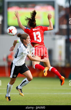 Deventer, Netherlands. 18th July, 2017. Nina Burger (L) of Austria vies with Lia Walti of Switzerland during a UEFA Women's EURO 2017 soccer tournament Group C match between Austria and Switzerland at the Adelaarshorst Stadium in Deventer, the Netherlands, July 18, 2017. The Austrians won the game 1-0. Credit: Ye Pingfan/Xinhua/Alamy Live News Stock Photo