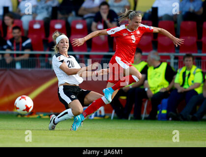 Deventer, Netherlands. 18th July, 2017. Lisa Makas (L) of Austria vies with Ana-Maria Crnogorcevic of Switzerland during a UEFA Women's EURO 2017 soccer tournament Group C match between Austria and Switzerland at the Adelaarshorst Stadium in Deventer, the Netherlands, July 18, 2017. The Austrians won the game 1-0. Credit: Ye Pingfan/Xinhua/Alamy Live News Stock Photo