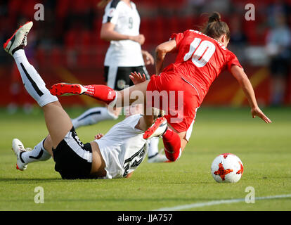 Deventer, Netherlands. 18th July, 2017. Ramona Bachmann (R) of Switzerland is fouled by Virginia Kirchberger of Austria during a UEFA Women's EURO 2017 soccer tournament Group C match between Austria and Switzerland at the Adelaarshorst Stadium in Deventer, the Netherlands, July 18, 2017. The Austrians won the game 1-0. Credit: Ye Pingfan/Xinhua/Alamy Live News Stock Photo