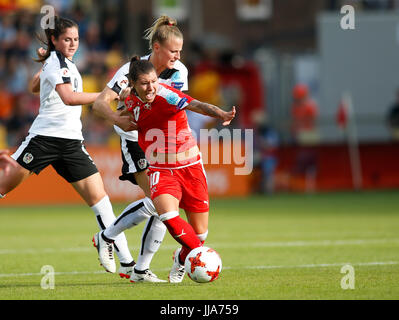 Deventer, Netherlands. 18th July, 2017. Ramona Bachmann (front) of Switzerland is fouled by Virginia Kirchberger of Austria during a UEFA Women's EURO 2017 soccer tournament Group C match between Austria and Switzerland at the Adelaarshorst Stadium in Deventer, the Netherlands, July 18, 2017. The Austrians won the game 1-0. Credit: Ye Pingfan/Xinhua/Alamy Live News Stock Photo