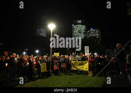 Sydney, Australia. 19th July, 2017. On the fourth anniversary of the introduction of offshore detention centres introduced by then Australian Prime Minister Kevin Rudd, GetUp! organised a candle lit vigil in Hyde Park to call for the closure of the Manus Island and Nauru offshore detention centres and for those held there to be brought to Australia. Credit: Richard Milnes/Alamy Live News Stock Photo