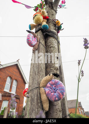 Yarn Bombing, Yarnbombing, Gurnard Village, Isle of Wight. 19th Jul, 2017. Photo taken: 16th Jul, 2017. The Gurnard Knit and Natter Group decorate Gurnard Village to raise money for The Gurnard Elephant Club, a local charity raising funds for people with memory problems and ability dogs for young people.  The timing coincides with the Isle of Wight Open Studios where artist open their workshops to show the public their crafts across the Island from 14th to 24th July 2017. Photo taken: 16th Jul, 2017. Stock Photo