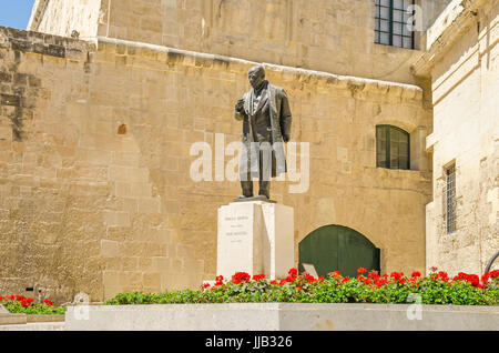 Statue of Prime Minister Paul Boffa,  sculpted by Vincent Apap, at the Castille Place (Castille Square) in Valletta, Malta Stock Photo